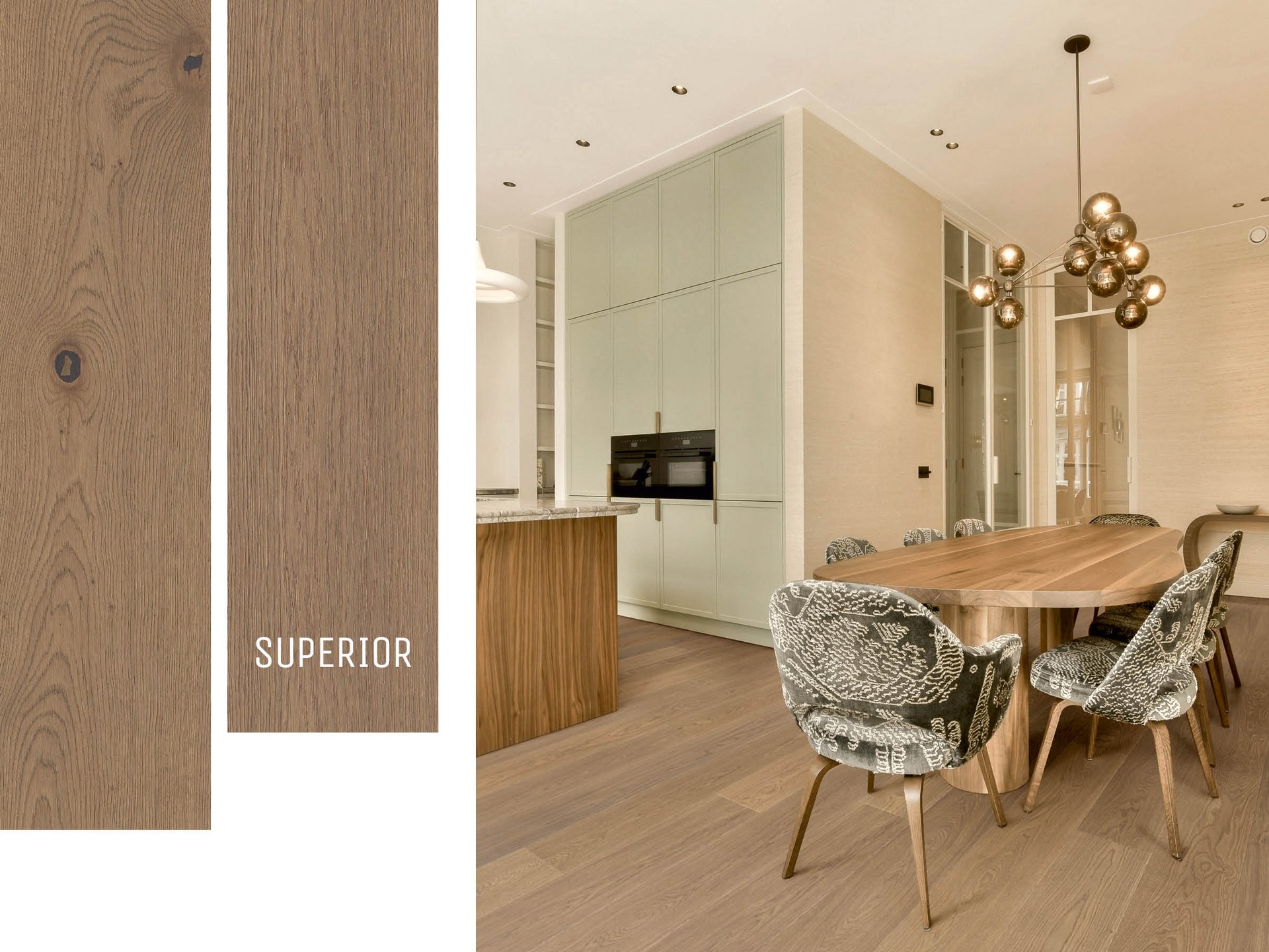 Dining room with golden pendant lamp, velvet chairs and country house floorboards in fine oak. The room is completed by a mint green kitchen.